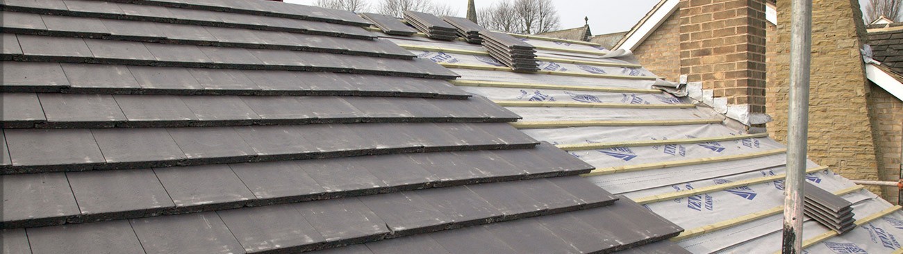 Strip and recover of a tiled roof